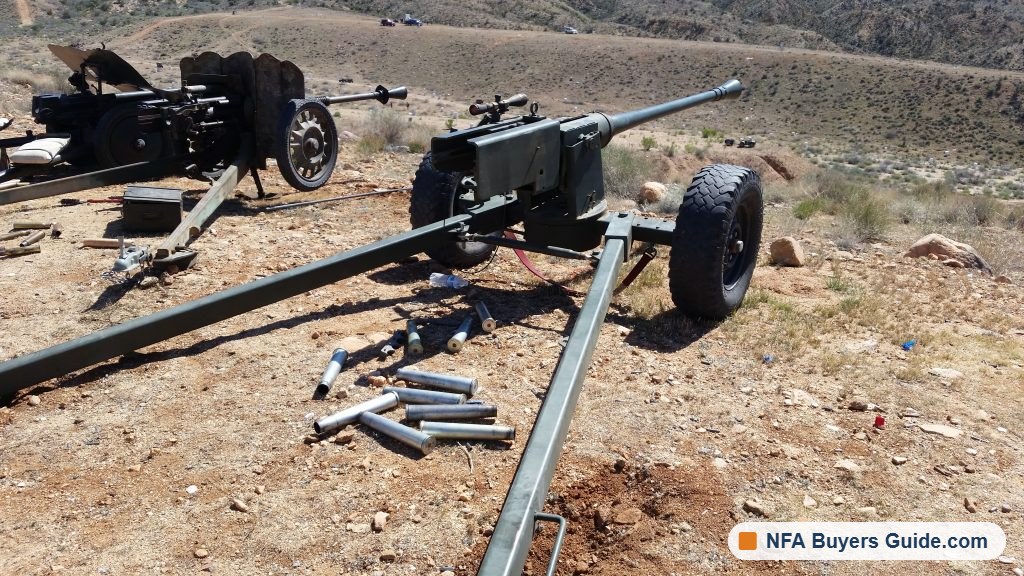 Anti-tank gun on the range with spent shell casings around it