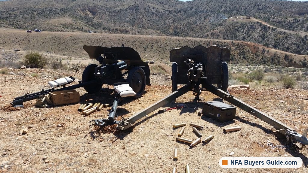 Pair of towed anti-tank guns on the firing line in the desert